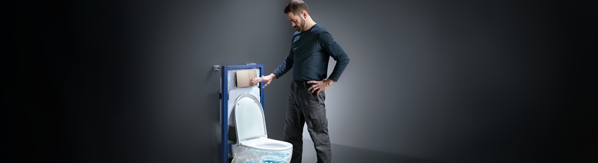 Man flushing the toilet Man flushing the toilet